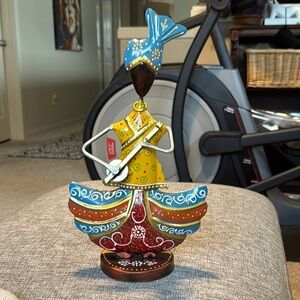 Blue and Yellow Triangular Face Sculpture Art